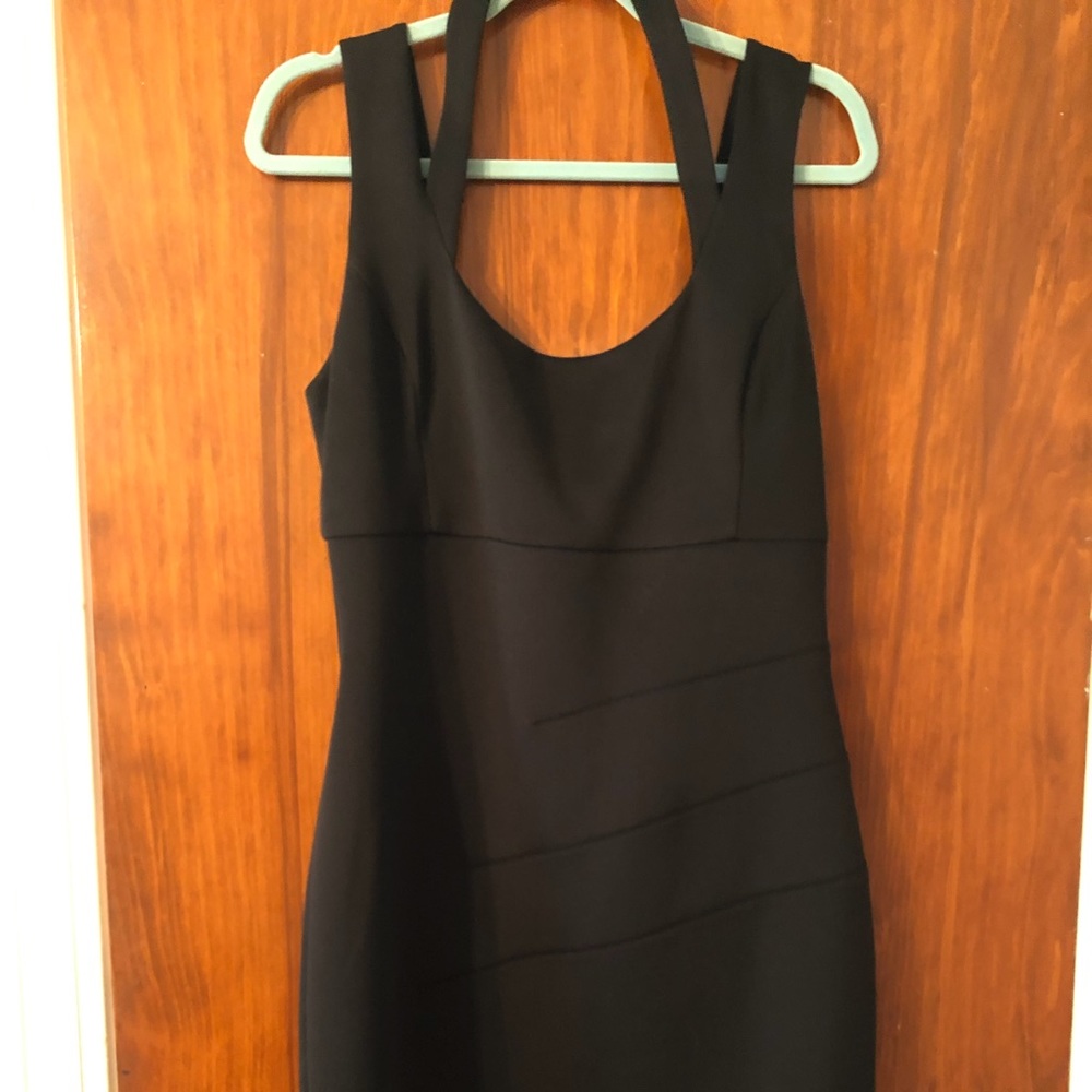 Black dress fits smaller than a 14. More like a 10